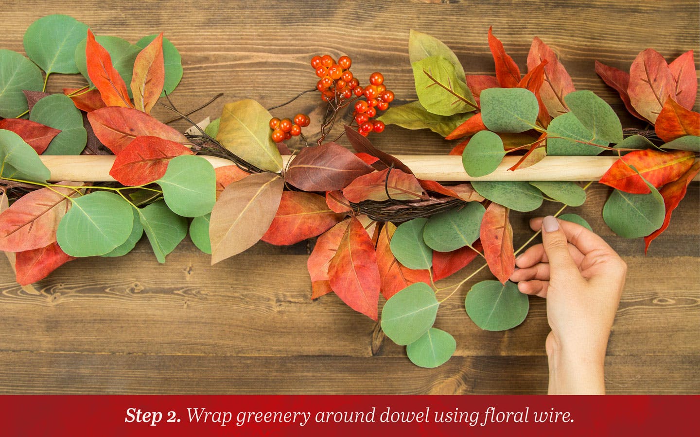 Step 2: Wrap greenery around wooden dowel using floral wire.